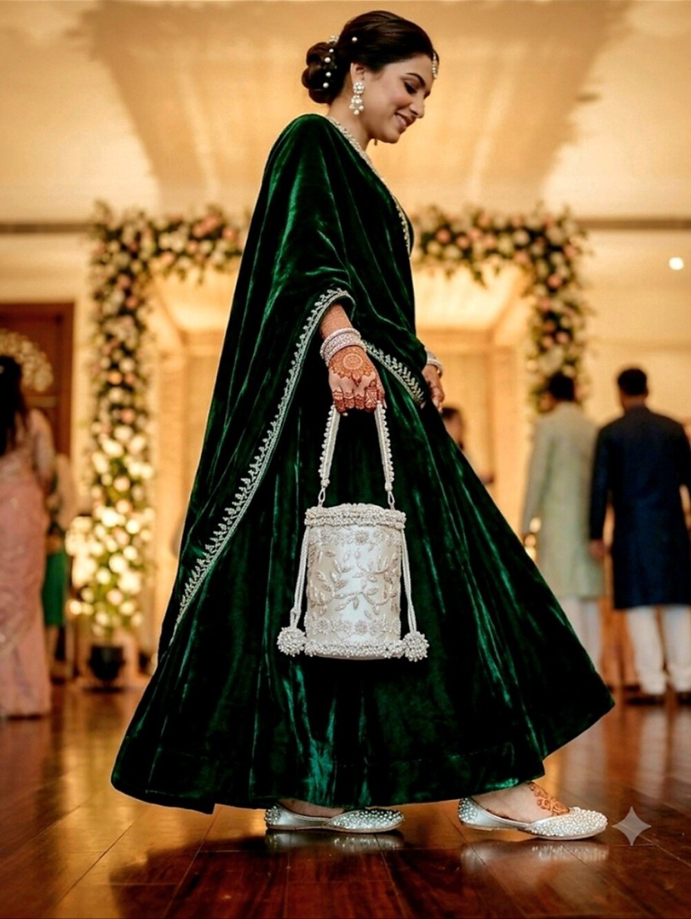 Embroidered Ivory Drawstring Bucket Bag In Gold And Silver. Price$145 Each.